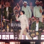 Bad Bunny Slips & Falls On Stage, Fans Keep Show Going