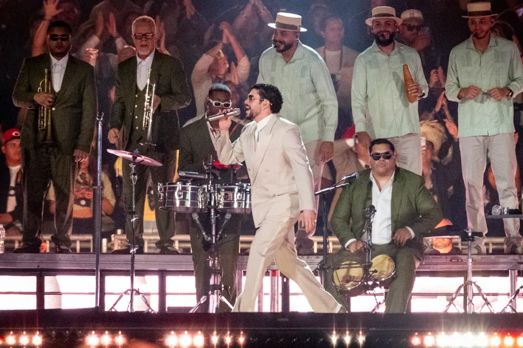 Bad Bunny Slips & Falls On Stage, Fans Keep Show Going