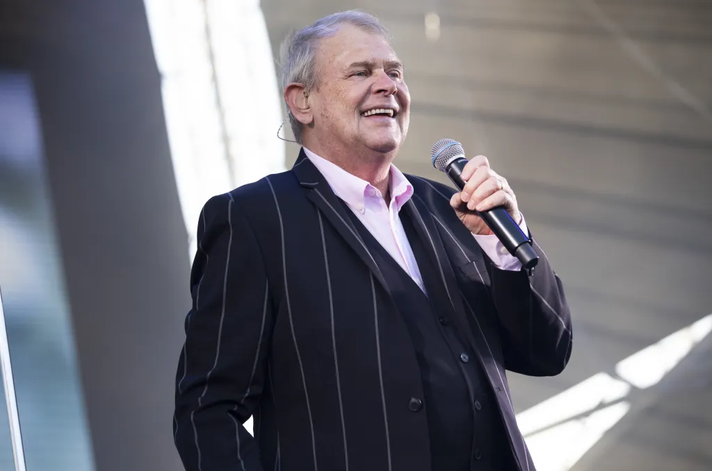 John Farnham Makes Rare Public Appearance Following Cancer Treatment