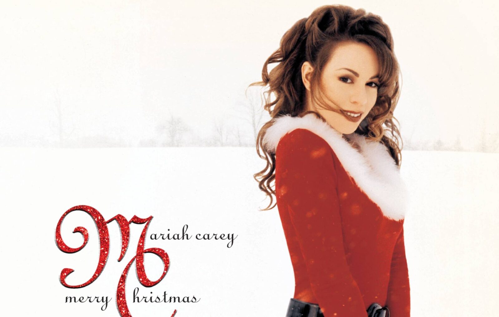 Mariah Carey reacts to 'All I Want For Christmas Is You' breaking record for longest-running Number One