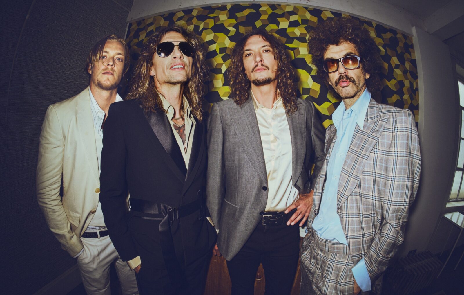 The Darkness "reimagine" Christmas classic 'Mistletoe And Wine' with "a few sprinkles of shoegaze and drone"