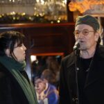 Watch Bono and Imelda May sing 'Christmas (Baby Please Come Home)' at annual Dublin busking gig