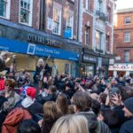 Watch The Molotovs shut down 'Oasis street' in Soho with Christmas guerrilla gig for The Big Issue