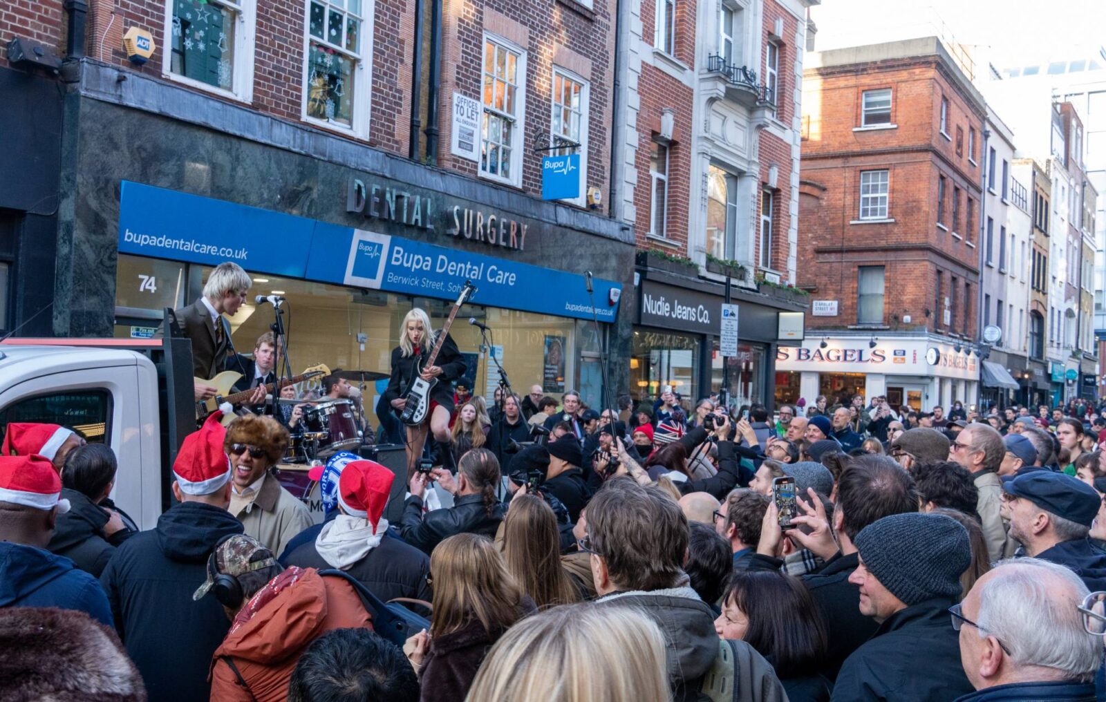 Watch The Molotovs shut down 'Oasis street' in Soho with Christmas guerrilla gig for The Big Issue