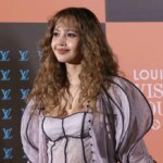 BLACKPINK’s Lisa Visits Viral Monkey Punch in Japan