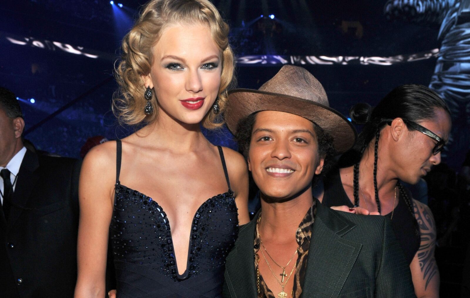 Bruno Mars responds after Taylor Swift fans accuse him of dissing her in liking post calling her “talentless"