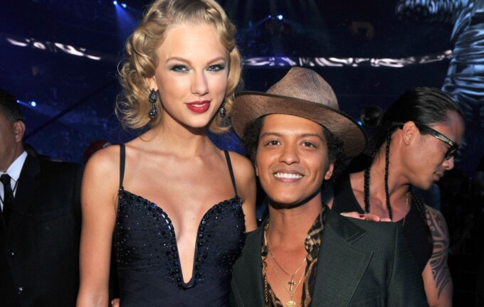 Bruno Mars responds after Taylor Swift fans accuse him of dissing her in liking post calling her “talentless"