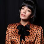 Lily Allen performs in receipt dress showing David Harbour's alleged gifts for other women