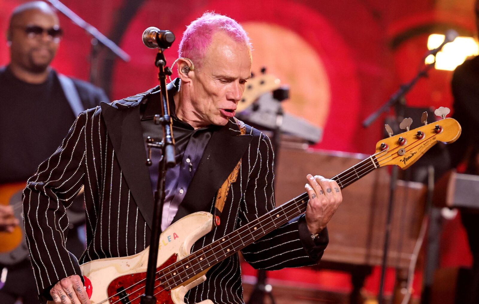 Red Hot Chili Peppers' Flea shows off head injury from "bizarre peeing accident"