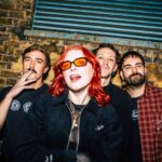 Sprints show "the frustration of a generation stuck in ‘wait mode’ while everything burns" on ominous single 'Trickle Down'