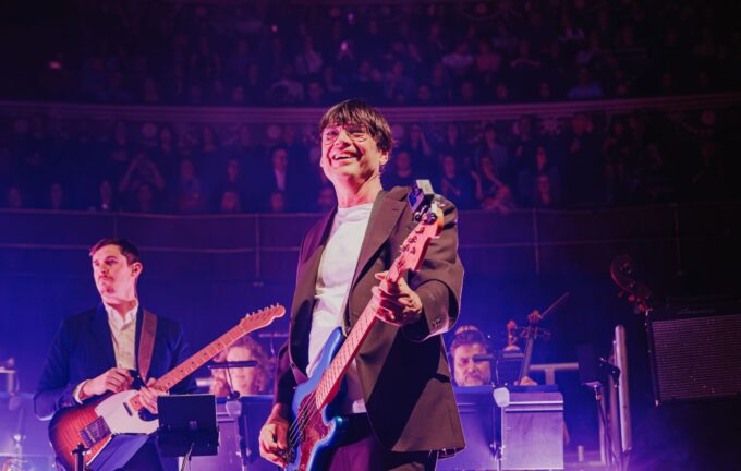 Watch Alex James deliver orchestral covers of Blur, Oasis, Pulp, Radiohead and Stone Roses as Britpop Classical tour kicks off
