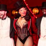 Megan Thee Stallion says being hospitalised after falling ill on stage was "a real wake-up call" after "pushing myself past my limits”