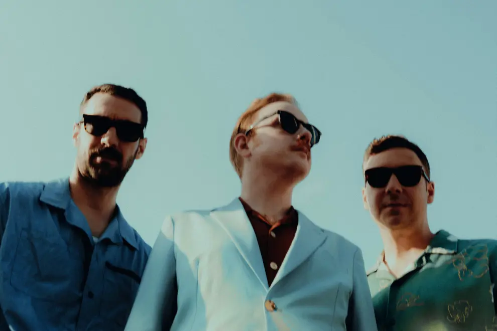 'The Fanbase Was There The Whole Time': Two Door Cinema Club On 'Tourist History' And Their Love Affair With Australia