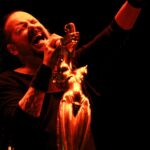 Watch KoRn play new song 'Reward The Scars' live for the first time to 50,000 people at Sick New World