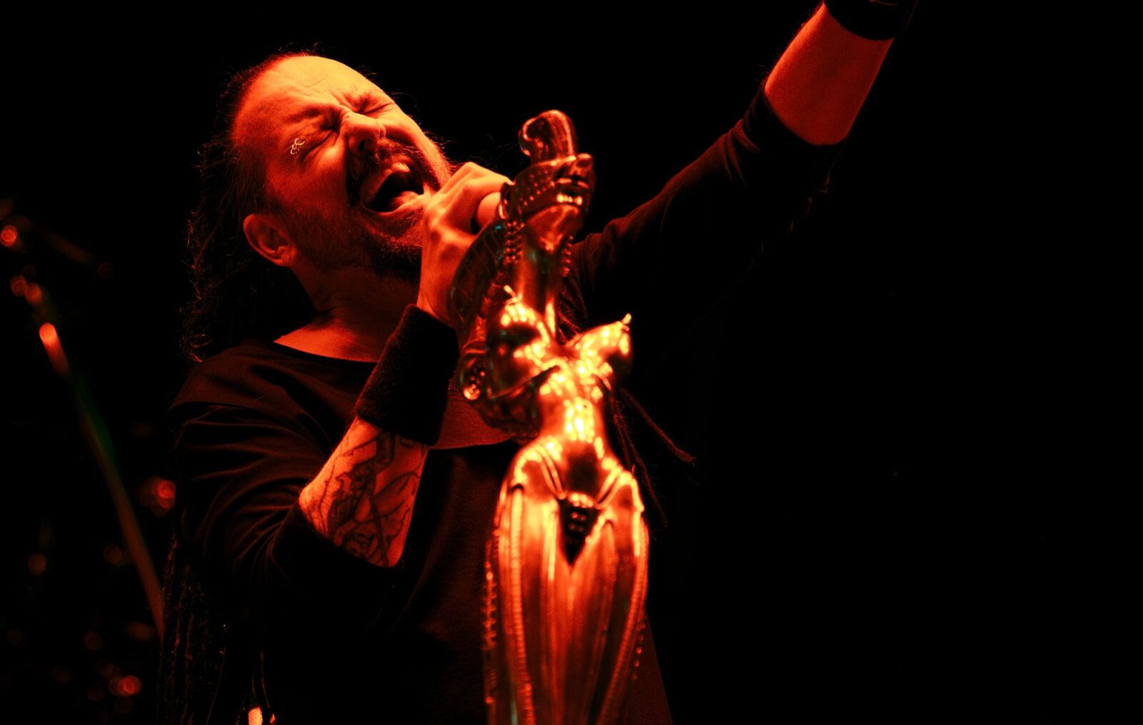 Watch KoRn play new song 'Reward The Scars' live for the first time to 50,000 people at Sick New World