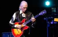 Yes postpone European tour for guitarist Steve Howe to undergo "essential operation"