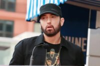 Eminem Is 'Not Homophobic,' Says John Waters, Citing Elton John Gift