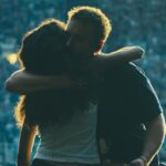 Watch Olivia Dean and Sam Fender celebrate nine weeks at UK Number One with surprise live performance of 'Rein Me In'