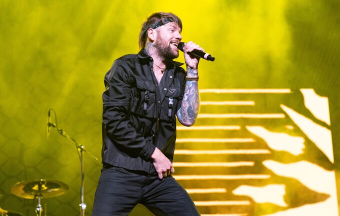 Beartooth's Caleb Shomo says he was taught being gay was "a sickness that you can cure with prayer" during Christian upbringing