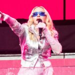 Madonna urges fans to "put your fucking phones down and connect" after returning to the stage