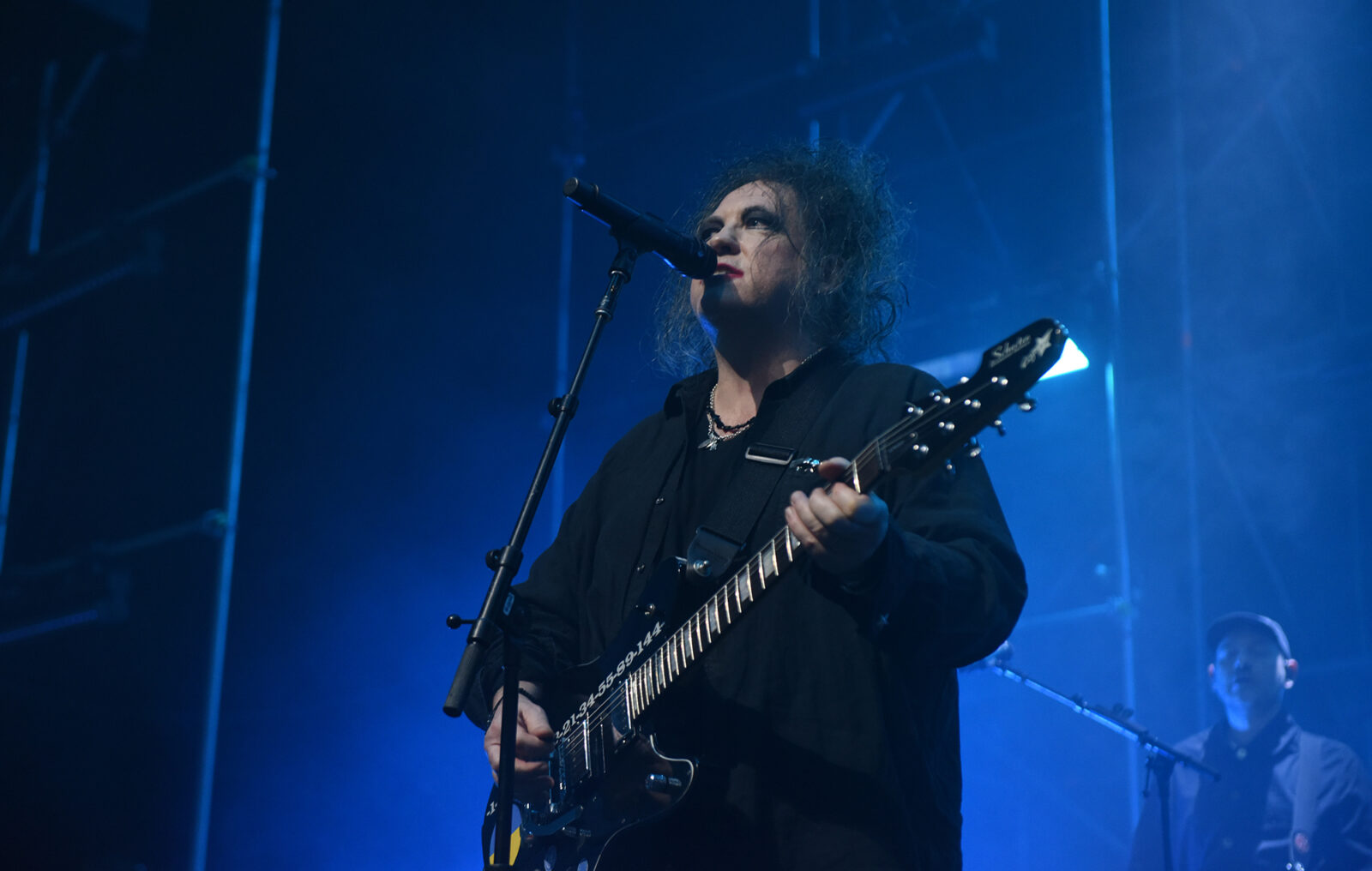Robert Smith says The Cure's next album is "done" with a "really poppy" and "upbeat" separate album also on the way